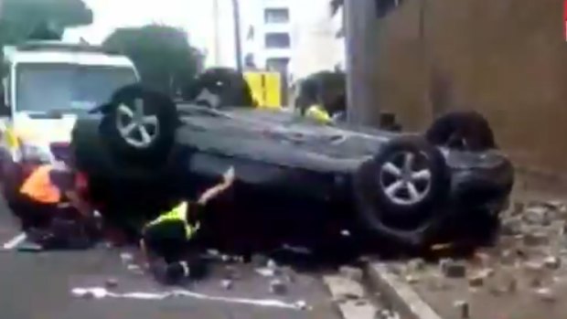 Driver's lucky escape after crashing through second level of car park