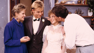 If Kylie and Jason are going to come back as Charlene and Scott, then they need to fully commit to the roles.