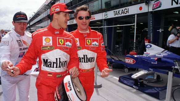 Ferrari drivers Michael Schumacher and Eddie Irvine at the Melbourne Grand Prix in 1998.