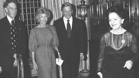 Kirk Douglas and his wife are hosted by Lady Mary Fairfax at Fairwater in September 1980.