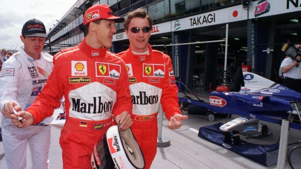 Ferrari drivers Michael Schumacher and Eddie Irvine at the Melbourne Grand Prix in 1998.