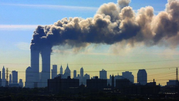 Smoke billows from the twin towers of the World Trade Centre in New York after aeroplanes crashed into both towers on September 11, 2001.