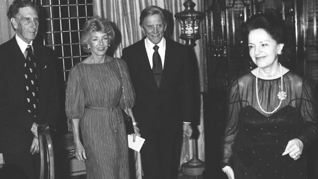 Kirk Douglas and his wife are hosted by Lady Mary Fairfax at Fairwater in September 1980.