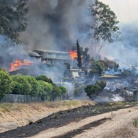 A photo taken by local Craig Gill, who escaped the Koolewong bushfire across the train tracks.
