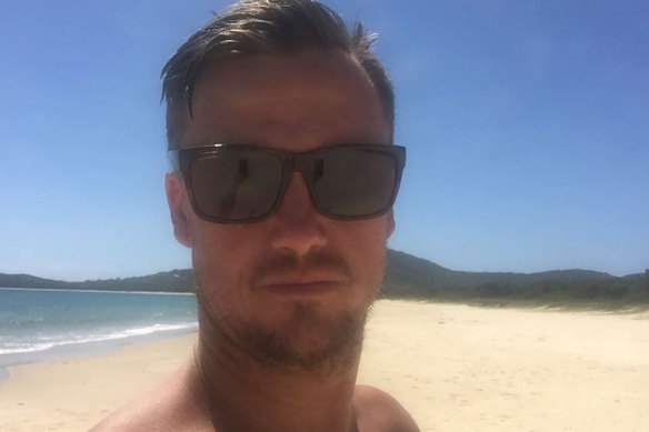 Former surfing champion Chris Davidson died after an alleged punching attack outside a pub on the NSW Mid North Coast.