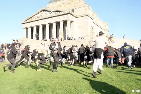 A screenshot from Rukshan Fernando’s livestream of police moving in after protesters occupied the Shrine of Remembrance this week.