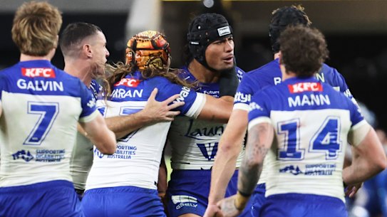 Canterbury celebrate the winning field goal by Stephen Crichton (centre).