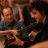 Timothée Chalamet as Bob Dylan in A Complete Unknown.