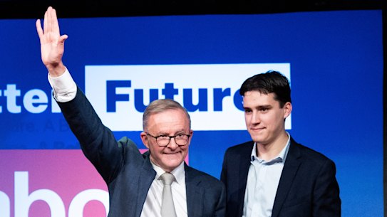 Anthony Albanese celebrates with son Nathan on election night last year.