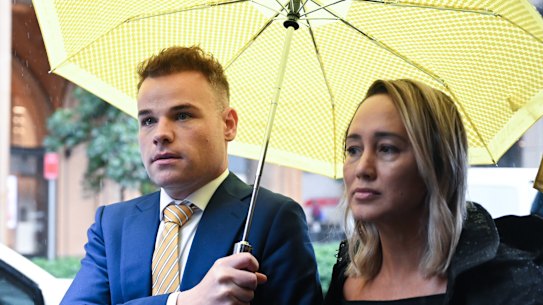 Taylor Auerbach leaves Federal Court with his lawyer Rebekah Giles after giving evidence in the Bruce Lehrmann defamation case in Sydney in April.