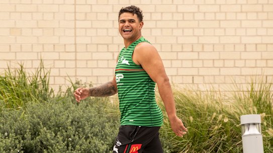 Latrell Mitchell heads into South Sydney training on Tuesday all smiles.