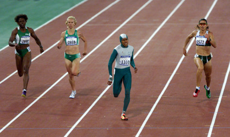 Cathy Freeman hits the front in the 400-metre final.