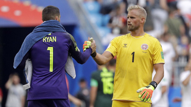 Respect: Kasper Schmeichel and Mat Ryan at the end of the game.