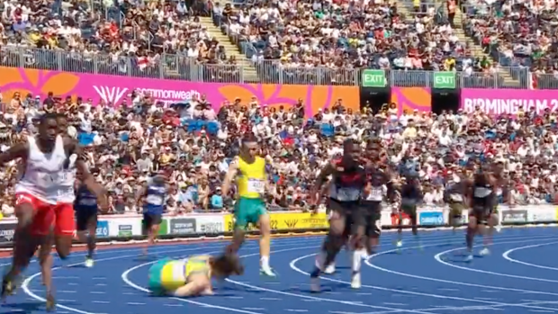 Australia’s Rohan Browning falls over in the heats of the men’s 4x100m relay.