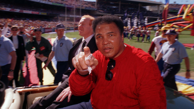 The greatest: Muhammad Ali completed a lap of honour on grand final day at the MCG in 1998.