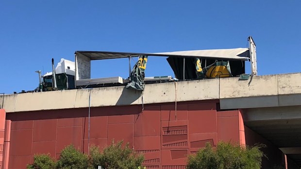 The truck that lost its load of plasterboard over the bridge.