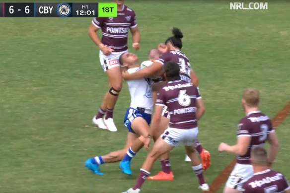 Jacob Kiraz was told to leave the first for assessment after this tackle.