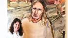 Laura Jones with her Archibald Prize-winning portrait of writer Tim Winton.