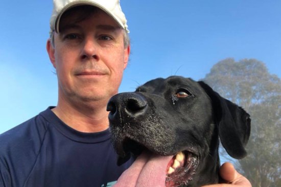 Shane Wright and his dog, Scully, out on a run.