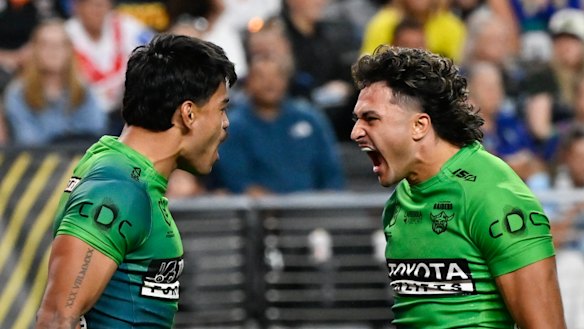 Matt Timoko and Xavier Savage celebrate.