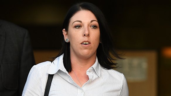Dreamworld senior ride attendant Sarah Cotter leaves the inquest after giving evidence on Monday.