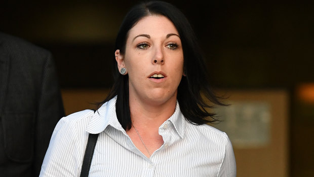 Dreamworld senior ride attendant Sarah Cotter leaves the inquest after giving evidence on Monday.