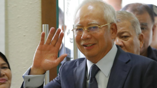Facing trial: Najib Razak.