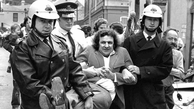 Jack Mundey being carried from a protest at The Rocks in the early seventies.