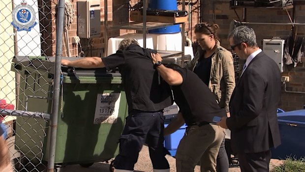 The man was arrested outside a Collaroy Plateau business on Thursday.