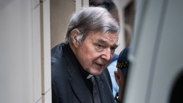 George Pell leaving Melbourne's Supreme Court building in August.