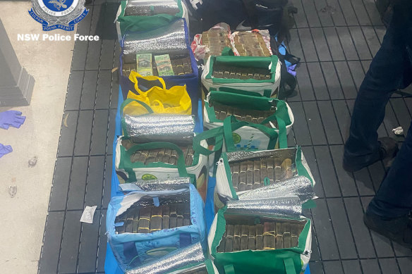 A man has been arrested allegedly attempting to flee the country after police seized about $7 million in cash last week.