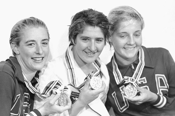 Dawn Fraser (centre) in Tokyo in 1964.