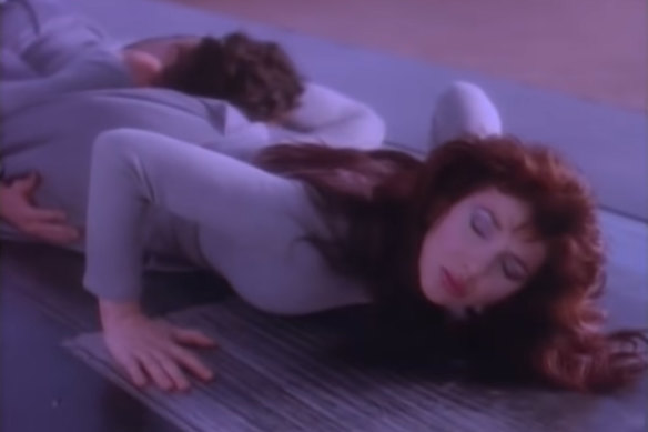 Kate Bush in the Running Up That Hill music video.