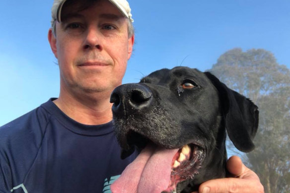 Shane Wright and his dog, Scully, out on a run.