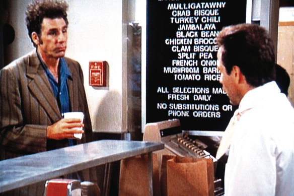 Michael Richards (left) as Kramer in Seinfeld’s Soup Nazi episode.