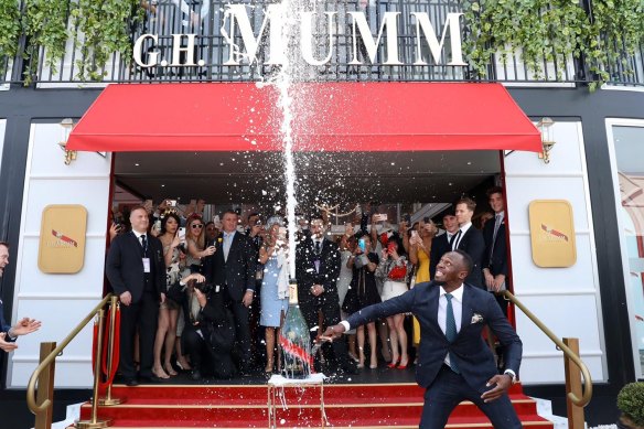 Olympic champion Usain Bolt setting off a 'champagne shower' at last year's Cup.