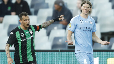 Marching orders: Western United's Allesandro Diamanti signals to Harrison Delbridge after the City defender was shown the red card.