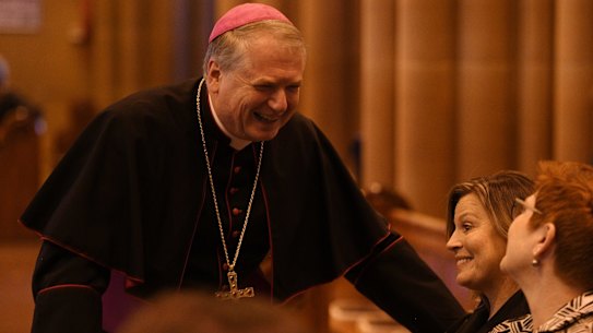 SYDNEY, AUSTRALIA - APRIL 15: Archbishop of Sydney Anthony Fisher talks with Jenny Morrison, the wife of Prime Minister Scott Morrison during the State Funeral for Carla Zampatti at St Mary's Cathedral on April 15, 2021 in Sydney, Australia. Australian fashion designer Carla Zampatti died aged 78 on 3 April 2021. Zampatti was appointed a Member of the Order of Australia in 1987 for service to the fashion industry as a designer and manufacturer. She was also made a Companion of the Order of Australia in 2009 for her service through leadership and management roles in the fashion and retail property sectors, multicultural broadcasting, and as a role model and mentor to women. Carla Zampatti named was Australian Businesswoman of the Year in 1980 and was awarded the Australian Fashion Laureate Award, the highest honour in the Australian fashion industry, in 2008. (Photo by Dean Lewins - Pool/Getty Images)