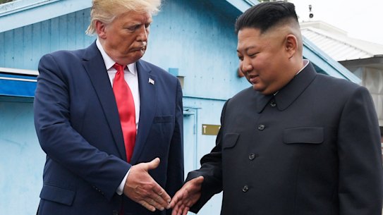 President Donald Trump meets with North Korean leader Kim Jong-un at the border village of Panmunjom in the Demilitarised Zone.