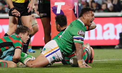 Raiders forward Josh Papalii crashes over for the match-winning try at GIO Stadium on Friday night.