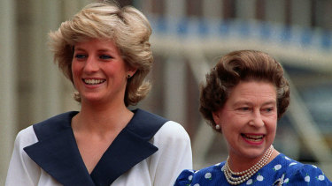 Diana, Princess of Wales, left, and Queen Elizabeth II smile to well-wishers in London in 1987.