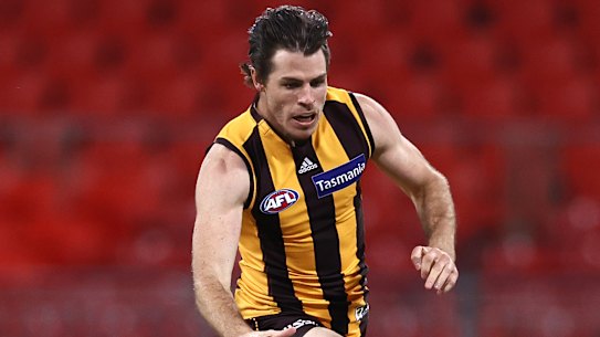 Kysaiah Pickett of the Demons competes for the ball against Isaac Smith .