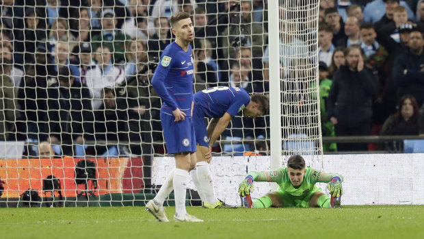 Chelsea goalkeeper Kepa Arrizabalaga stretches on the pitch.