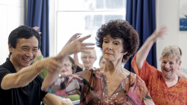 Anne-Marie Dowling in class with Queensland Ballet artistic director Li Cunxin as part of the Victorian Seniors Festival in Melbourne. 