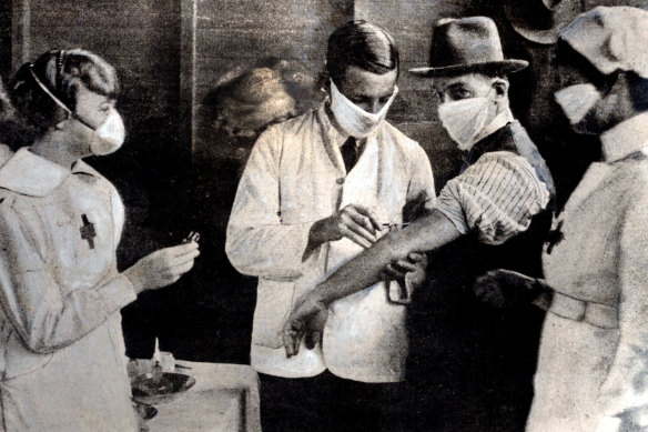 Inoculation at a special depot in Hyde Park in February 1919, at the height of the influenza epidemic in Sydney. 