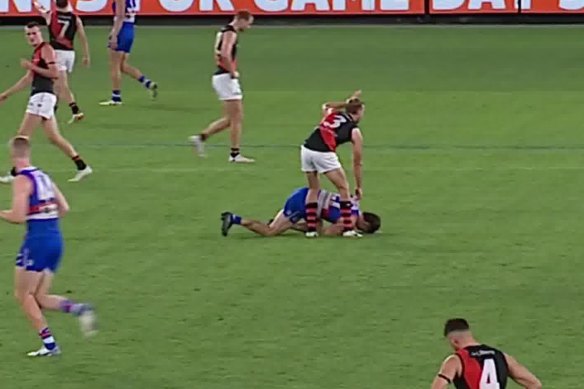 Tom Liberatore’s opponent signals for assistance.