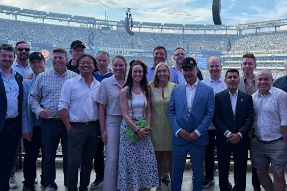 NRL boss Peter V’Landys [third from left]; Patrick Delany [fifth from left] with DAZN’s billionaire owner Len Blavatnik [fifth from right] and CEO Shay Segev [third from right] in New York in July.