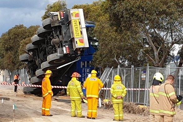 A crane has toppled at a construction site in Clyde North. 
