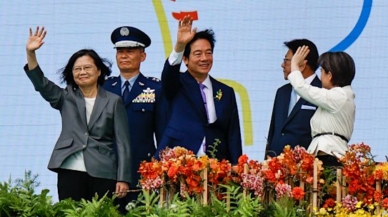 President William Lai Ching-te (centre), Vice President Hsiao Bi-khim (right) and Former Taiwanese president Tsai Ing-Wen wave during the Taiwanese Presidential Inauguration Ceremony.