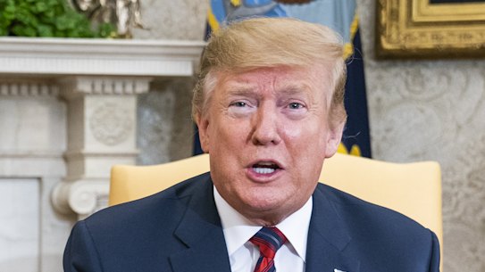US President Donald Trump speaks while Moon Jae-in, South Korea's president, left.